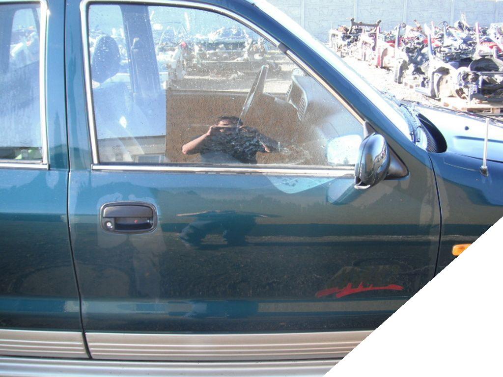 KIA SPORTAGE LIFT 99- ZAMEK Z DRZWI PRAWY PRZÓD