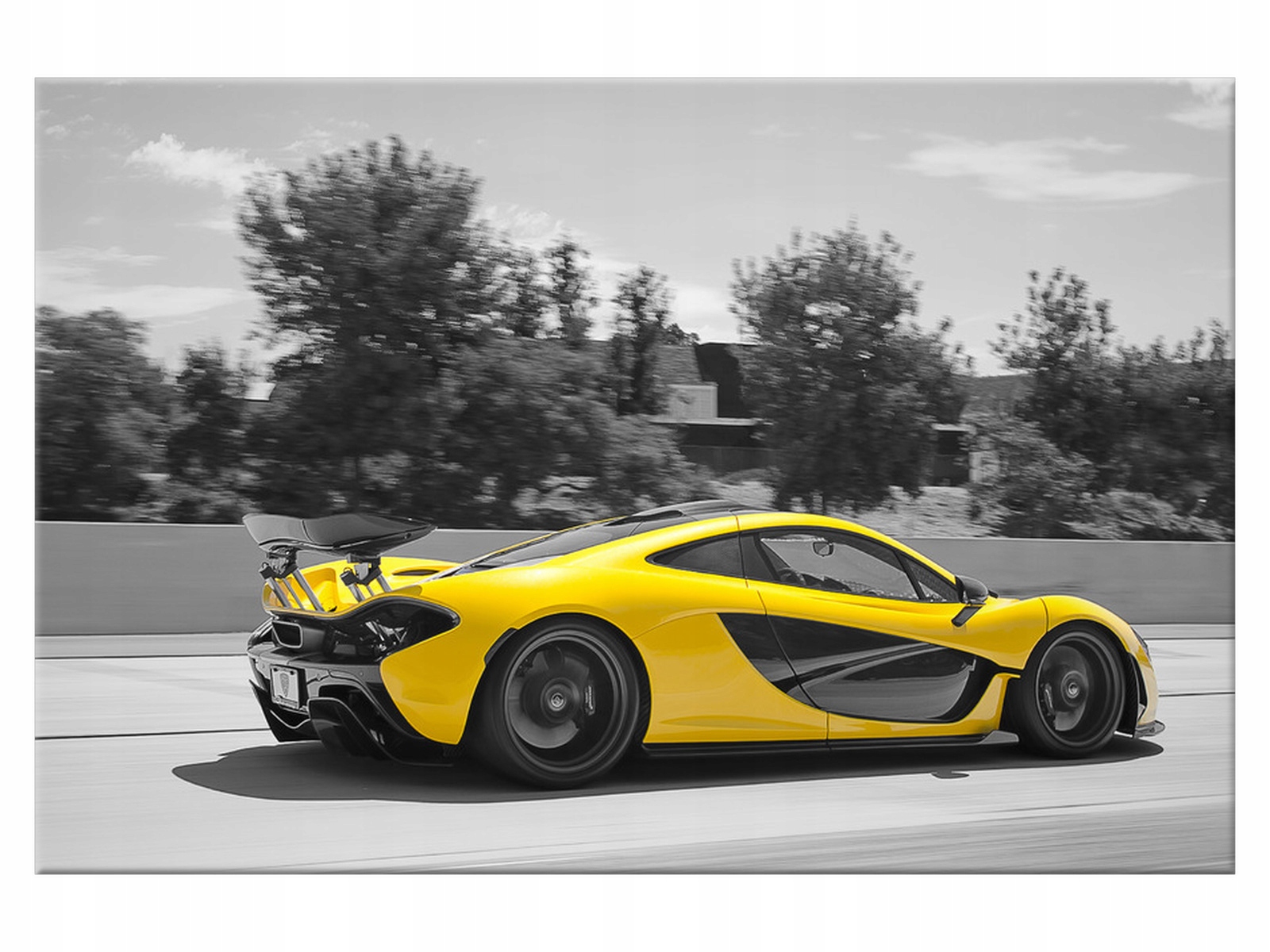 

Obraz Żółty McLaren P1 60x40 Niebo 1692A_1E salon