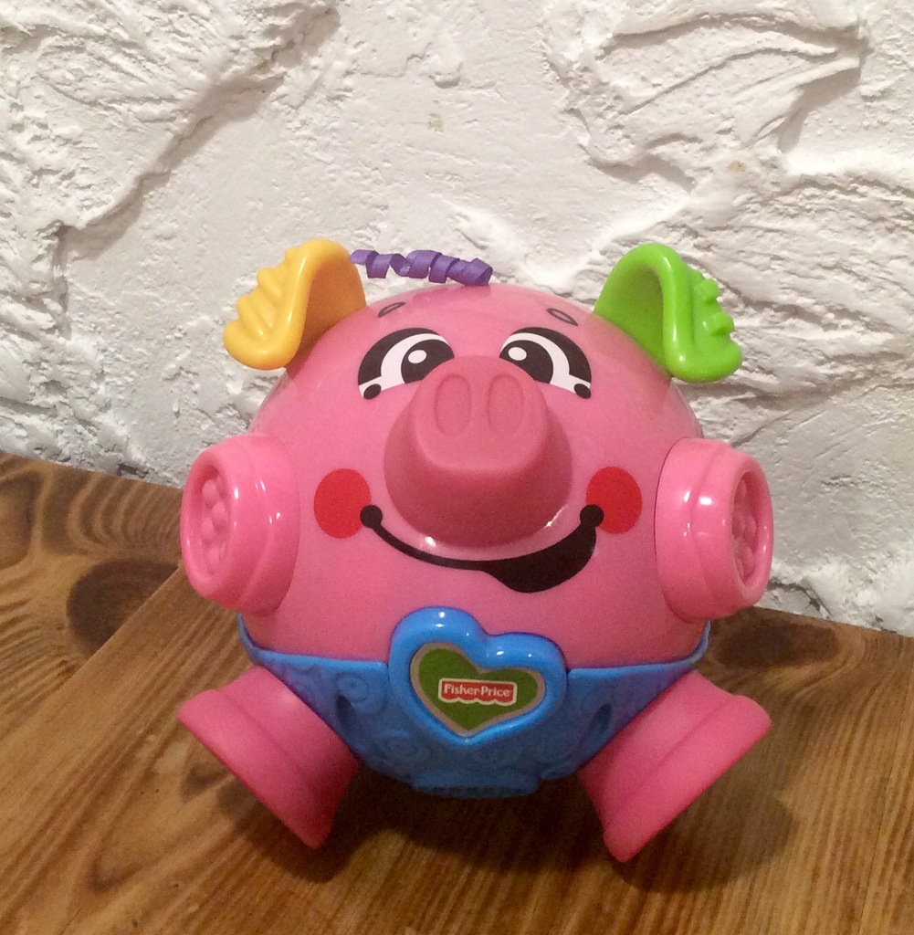 Fisher Price ***wibrująca świnka***bawiskoczek