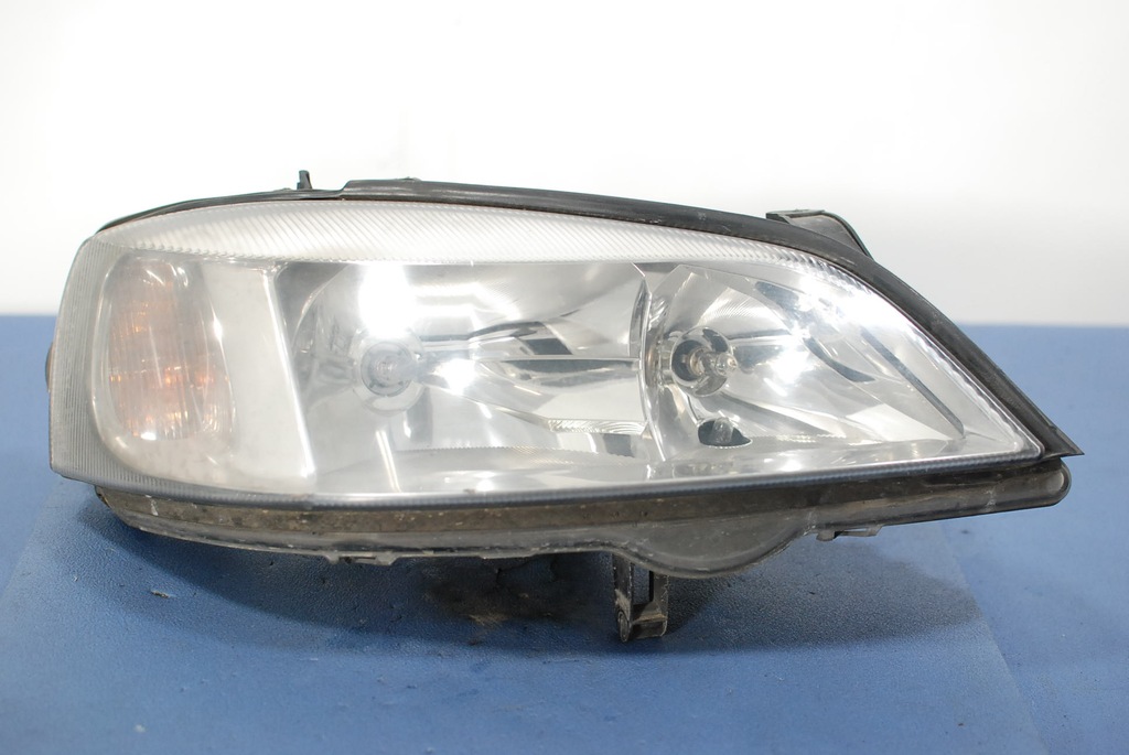 OPEL ASTRA II G REFLEKTOR PRAWY 009117304RH EUROPA