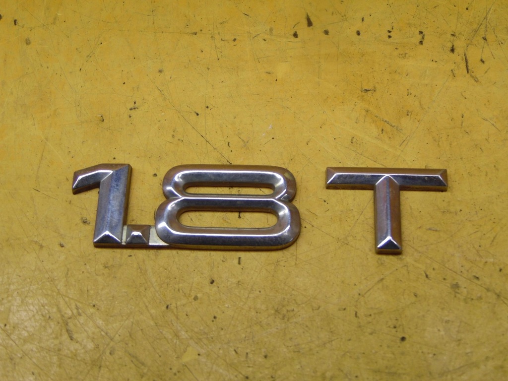 ZNACZEK EMBLEMAT AUDI A4 B5 FL 1.8 T