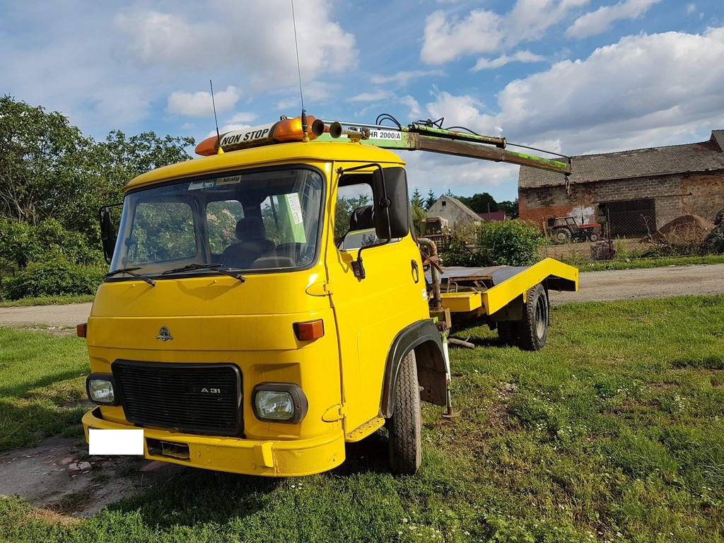 Sprzedam autolaweta AVIA z HDS nowa cena 