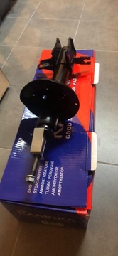Mazda 323 94 - shock absorber left rear oily new, фото