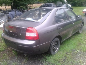 DRZWI KLAPA BŁOTNIK KIA SHUMA ĆWIARTKA LAMPA SZYBA