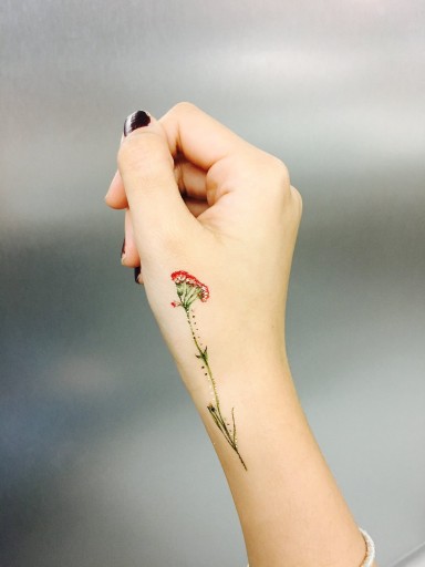 Тату цветок на бумаге в стиле Vintage Flower