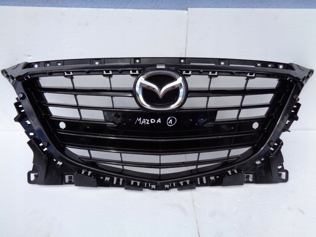 фото №1, Mazda 3 решётка радиатора решётка радиатора bje1-50712 лак оригинал